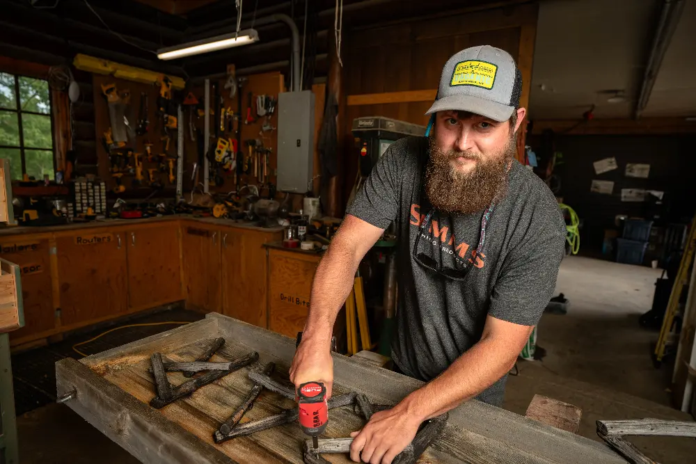 A man working on a project in a workshop