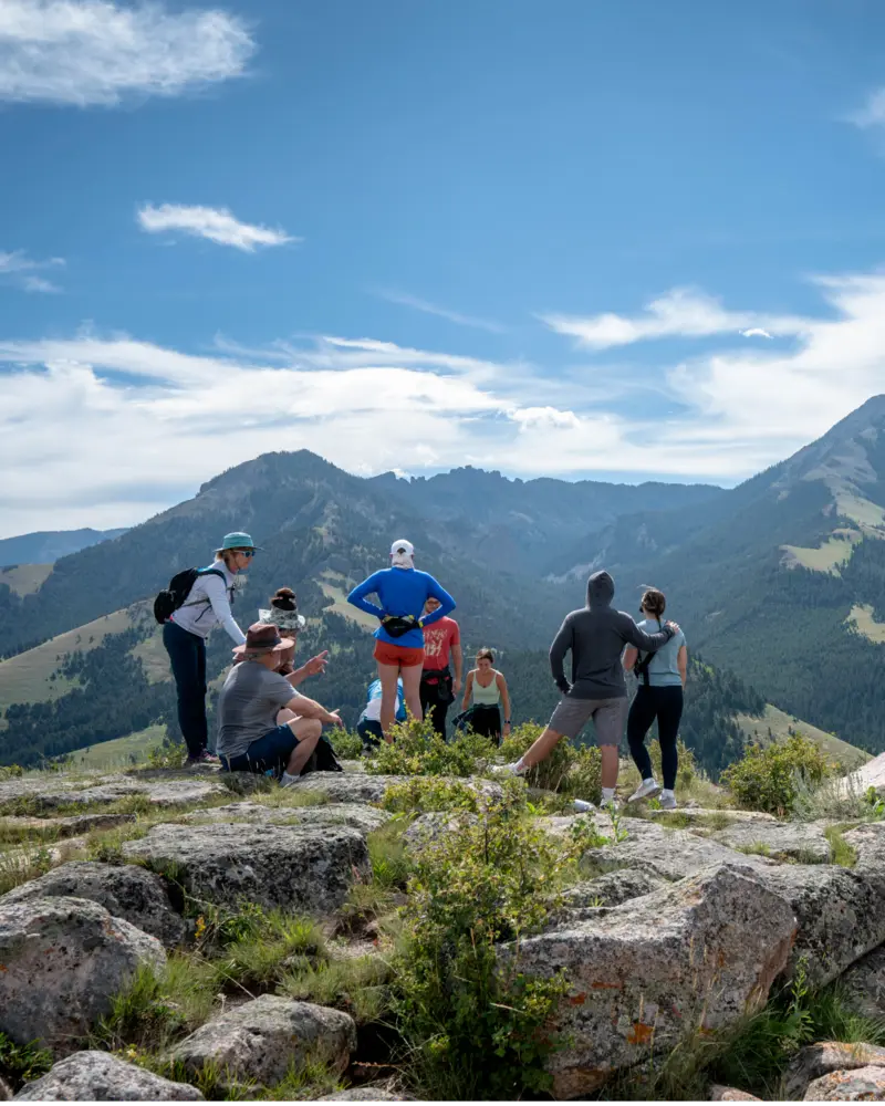 A group of people on a rocky hillside