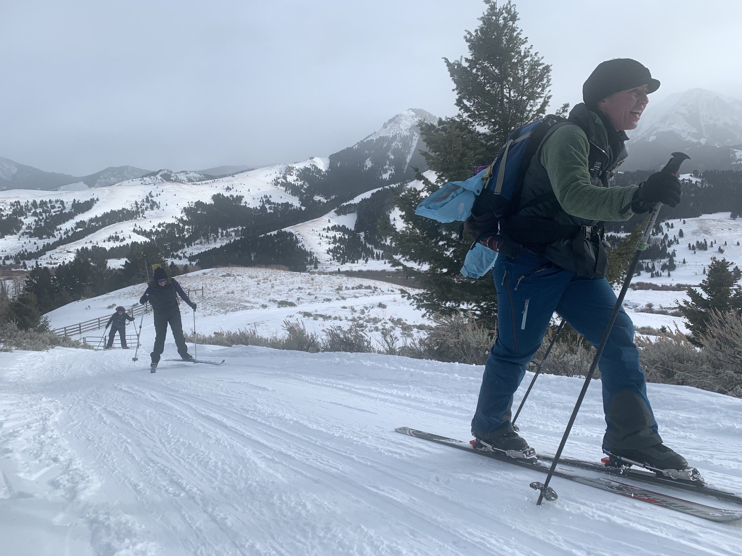 A group of skiers on a snowy slope