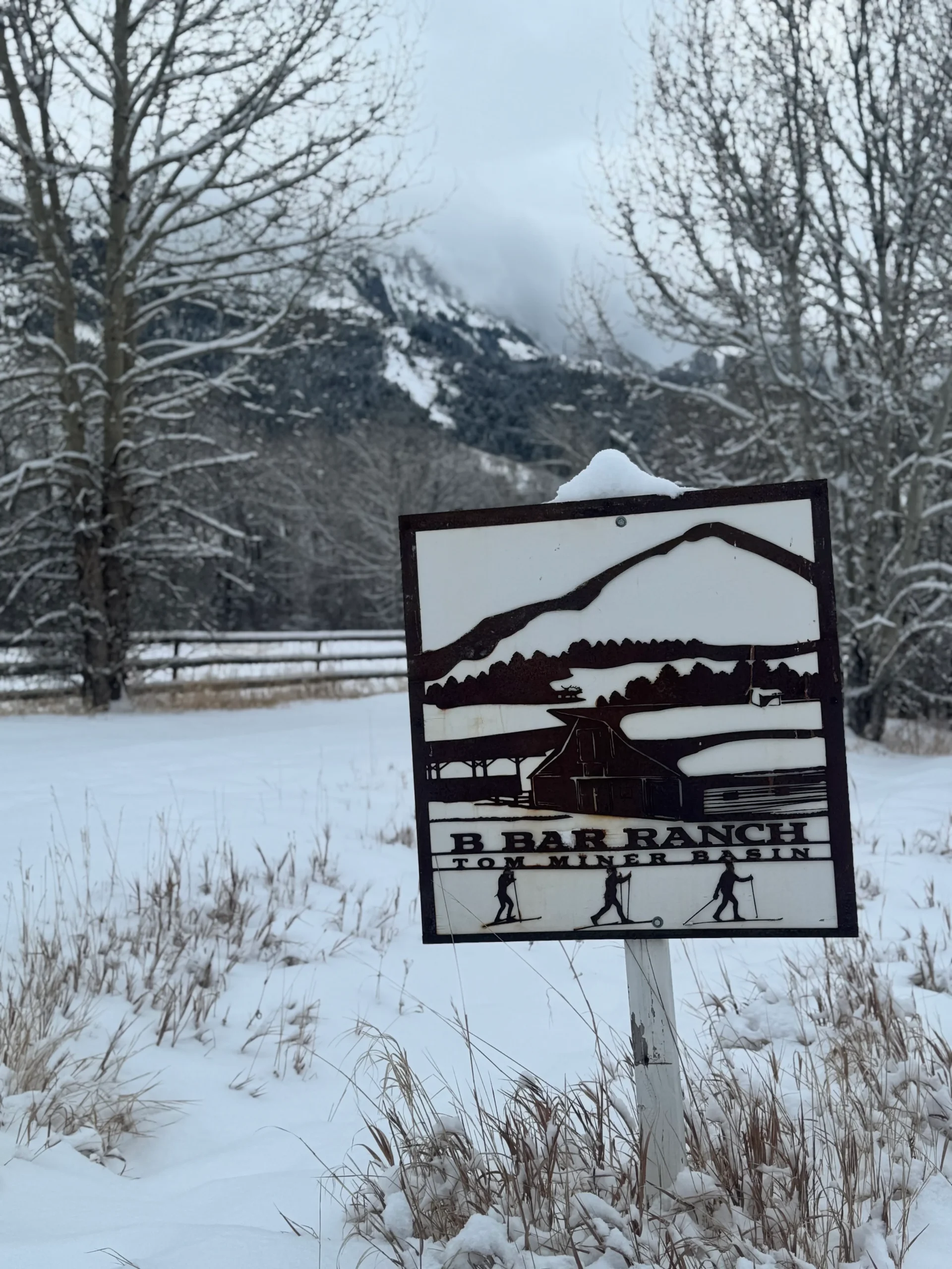 Sign that says B Bar Ranch and welcoming people to their ski trails.